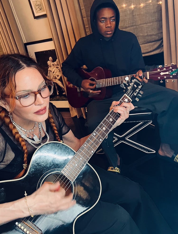 Madonna with guitar.
