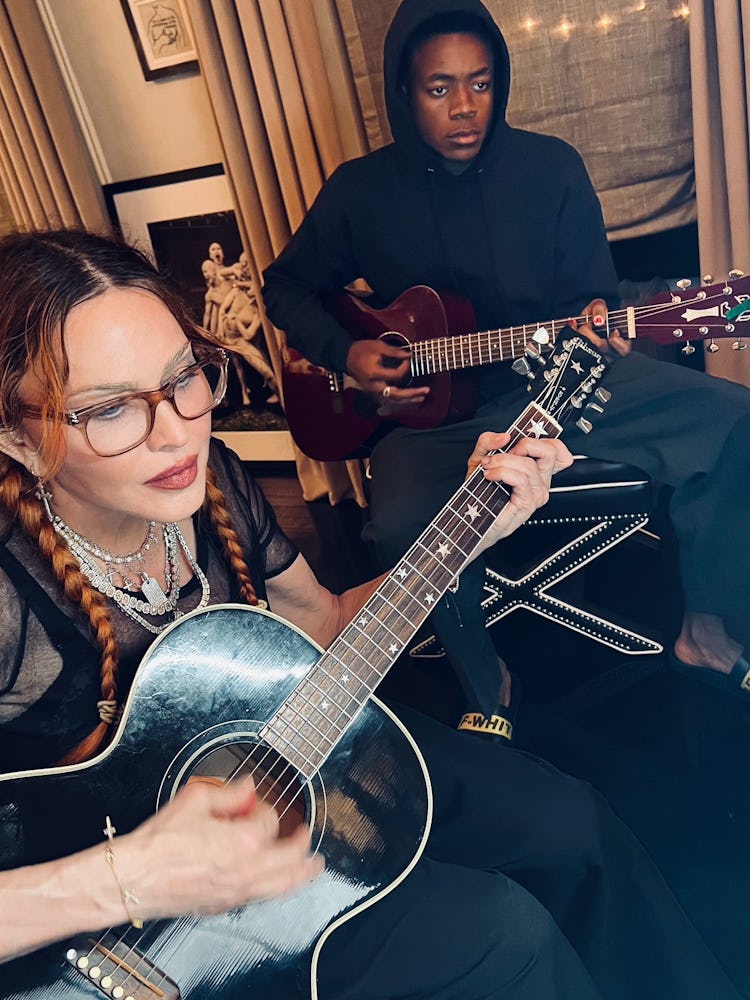 Madonna with guitar.