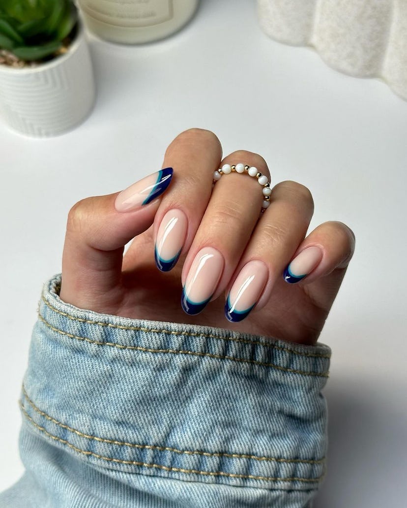Try double-lined blue French tip nails.