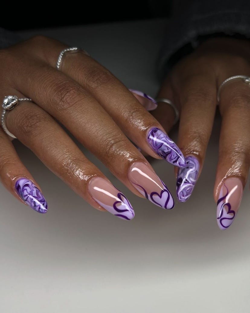 Try marbled purple French tip nails.