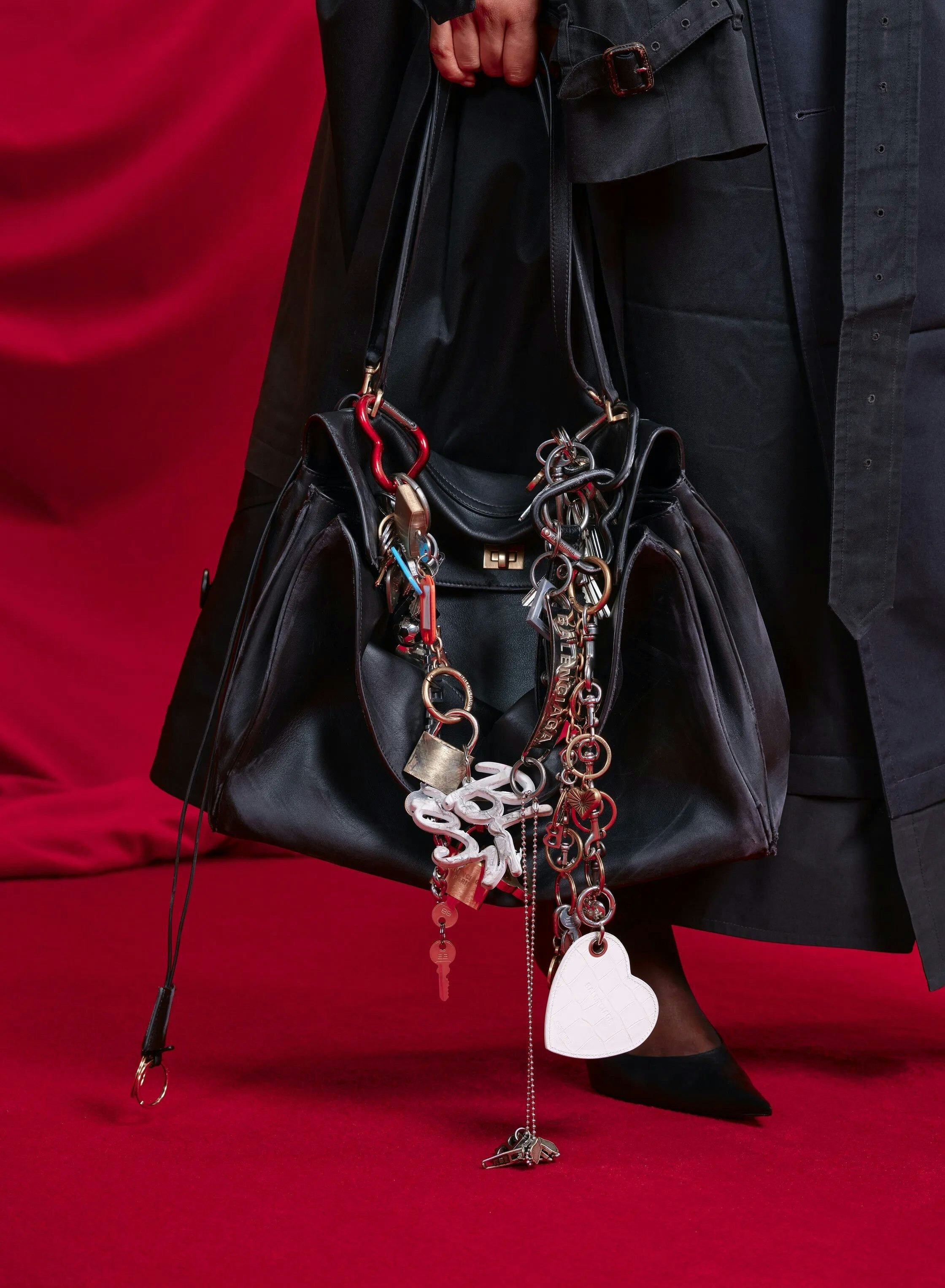 Bag Charms Keychains Are The Accessories Trend That Won T Quit C10fb4a2 Ab51 469d 86bb 3acb2713cf7c F8fcd5d8 09d1 40d8 A1e0 77fe9f8c2310 00007 Balenciaga Spring 2024 Ready To Wear Detail Credit Brand 1