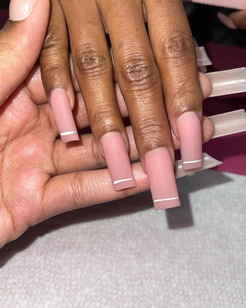 Try barely-there French tip nails.