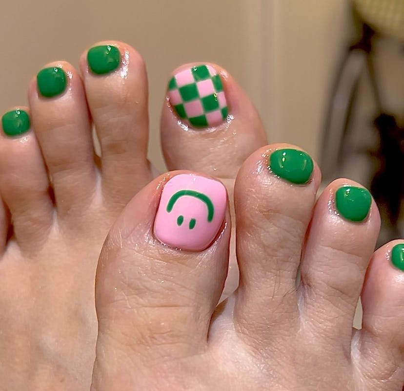 Try a two-toned pedicure with checkered prints and smiley faces.