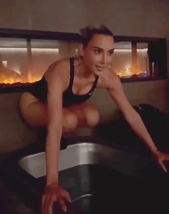 Kim Kardashian trying an ice bath.
