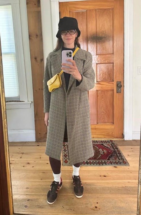 Julia Gall wearing a yellow crossbody bag