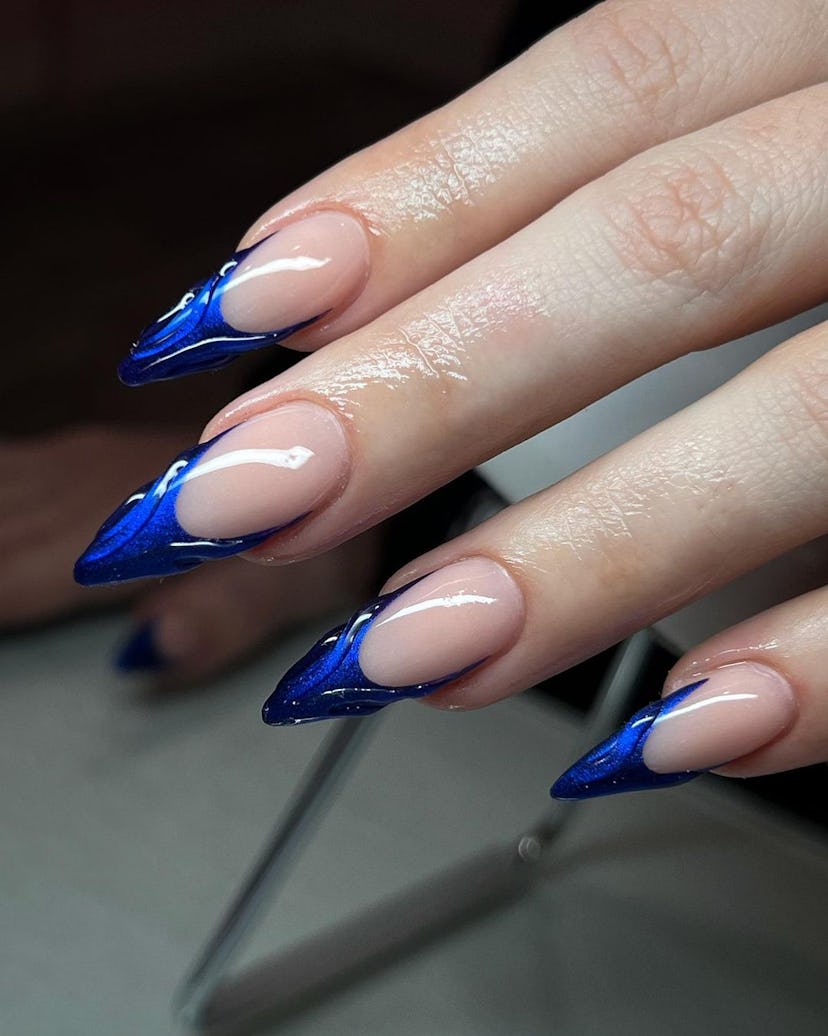 Sapphire blue French tip nails are perfect for Sagittarius signs.