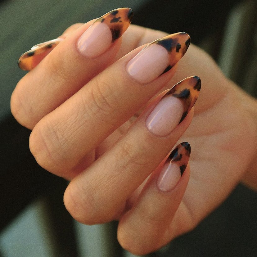 Tortoiseshell French tip nails are perfect for Capricorn signs.