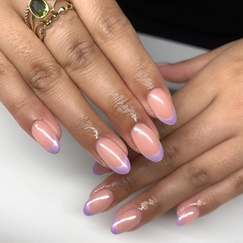 Shimmering lavender French tip nails are perfect for Pisces signs.