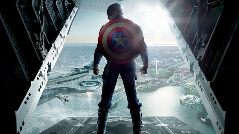 Chris Evans poses as Steve Rogers on a 'Captain America: The Winter Soldier' poster