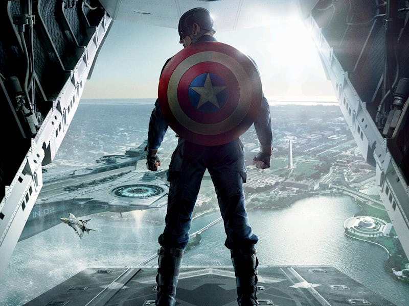 Chris Evans poses as Steve Rogers on a 'Captain America: The Winter Soldier' poster