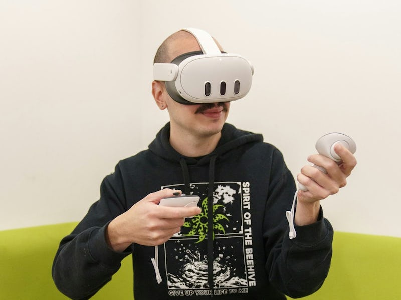 Inverse Senior Editor James Pero wearing Meta's Quest 3 headset