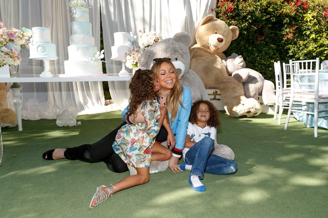 Mariah Carey snuggles with twins Monroe and Moroccan Cannon at the Moroccan Scott Cannon and Monroe ...