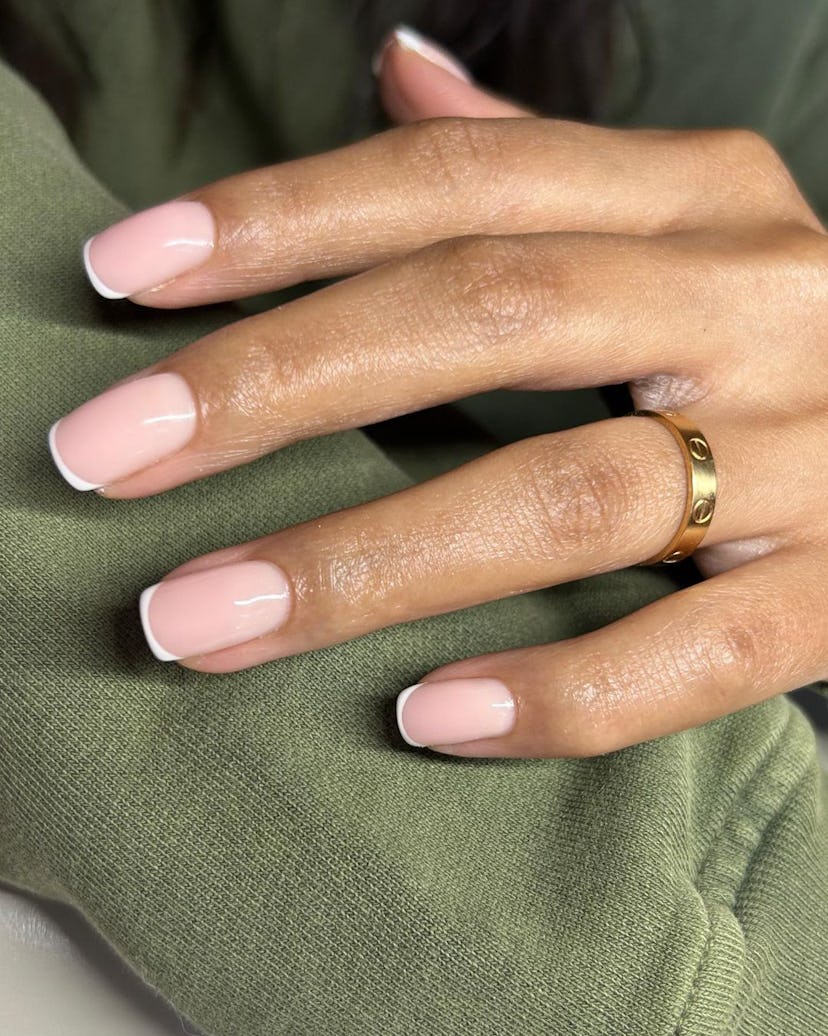 Libras are most likely to wear trendy micro French tip nails.