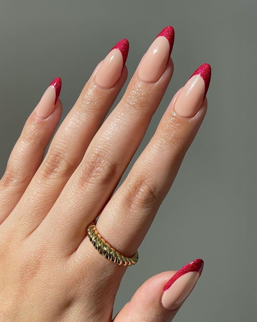 Red French tip nails are perfect for Aries signs.
