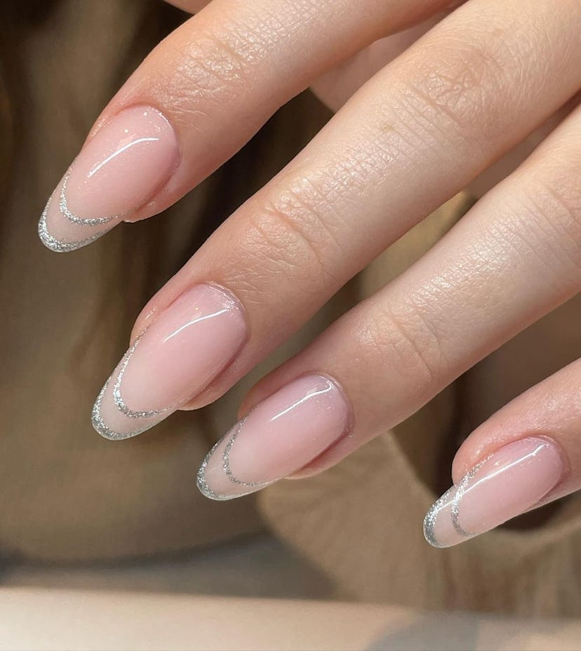 Silver invisible French tip nails are perfect for Gemini signs.