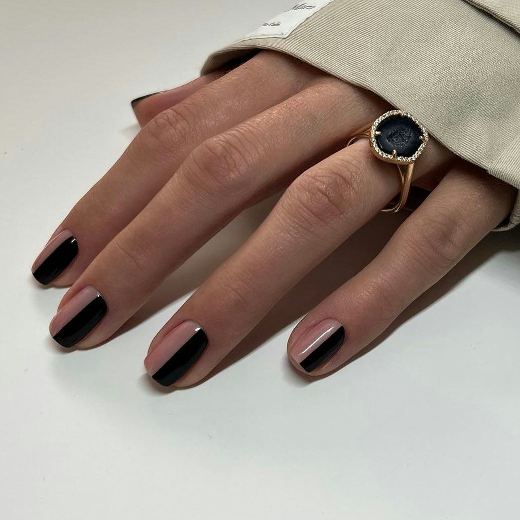 Try two-toned black and sheer pink nails.