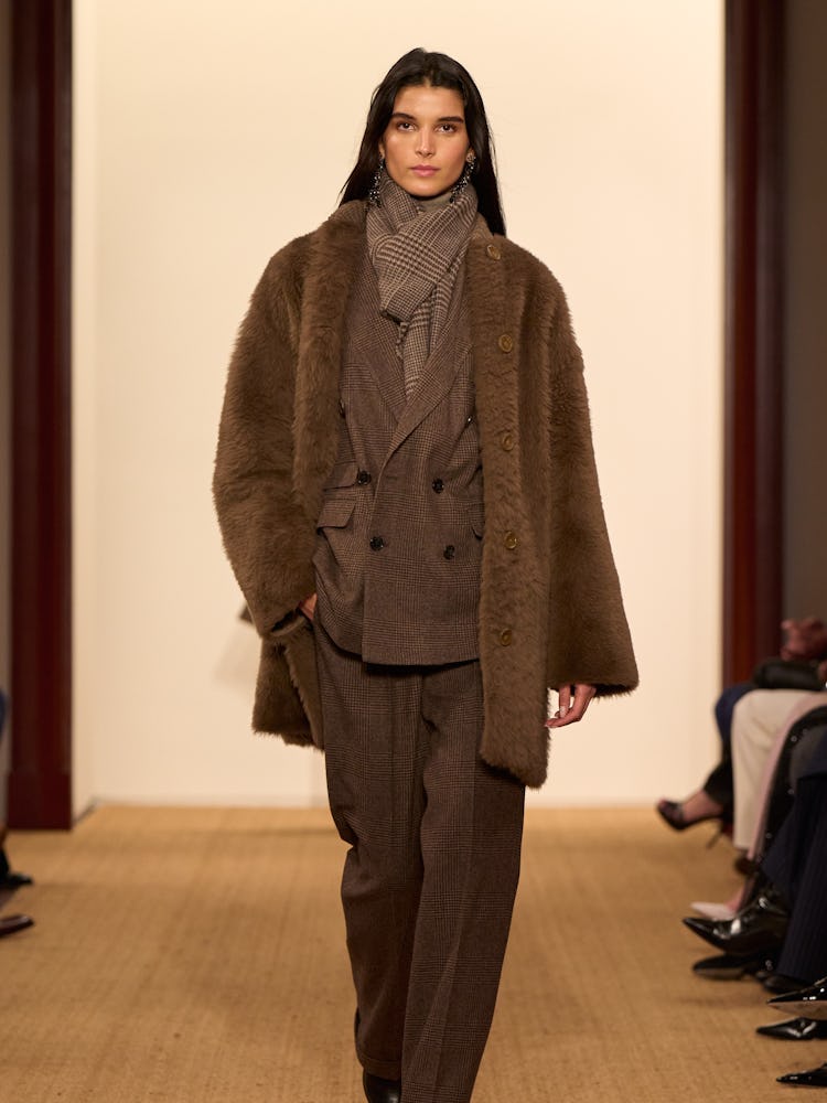 a look from ralph lauren fall/holiday 2024 collection runway show