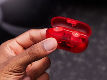 Beats $79.99 Solo Buds wireless earbuds in red with transparent red charging case