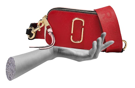 A red Marc Jacobs Snapshot bag.