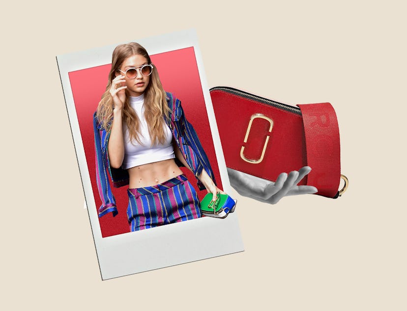 Gigi Hadid carries a Marc Jacob Snapshot bag.