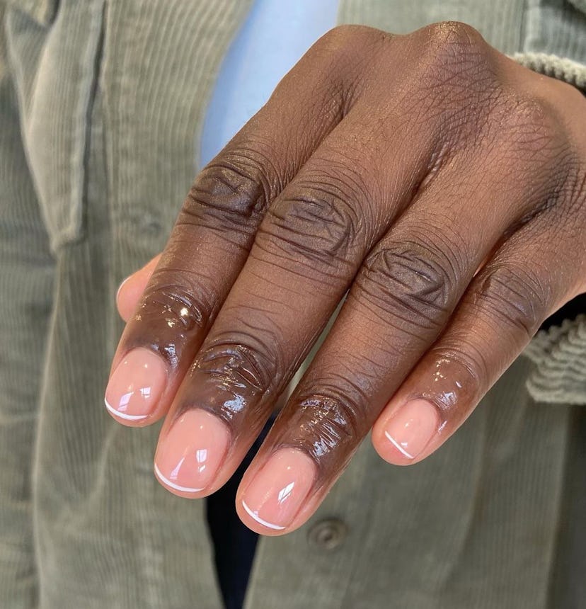 Traditional white French tips and micro French tip nails are trending for summer 2024.