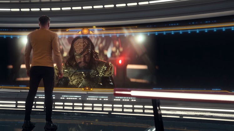 Captain Pike confronts a singing Klingon.