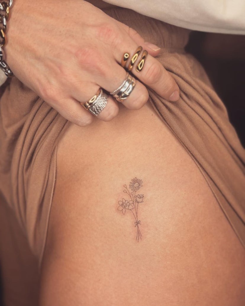 One clever spot to hide a tattoo is at the top of your thigh.