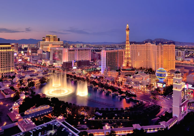 City skyline at night with Bellagio Hotel water fountains, Las Vegas, Nevada