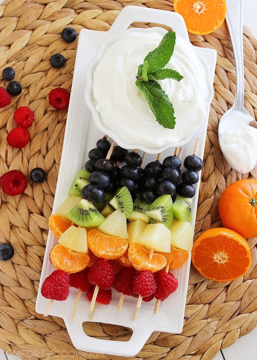 Fruit skewers with yogurt dip is a make-ahead breakfast for busy sports mornings. 