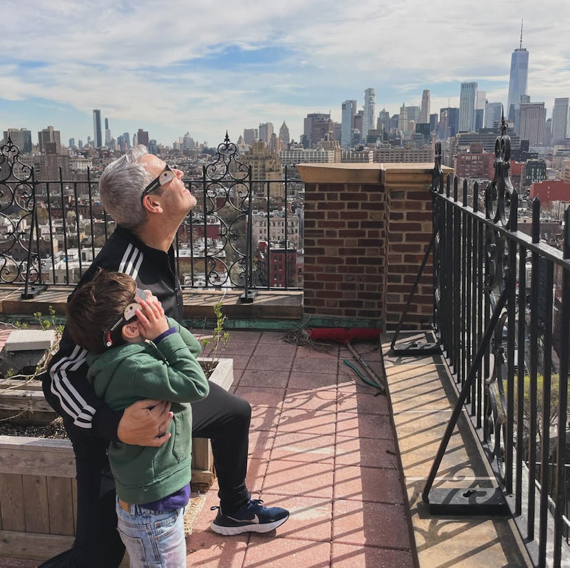 Andy Cohen and son Ben watching the solar eclipse 2024.