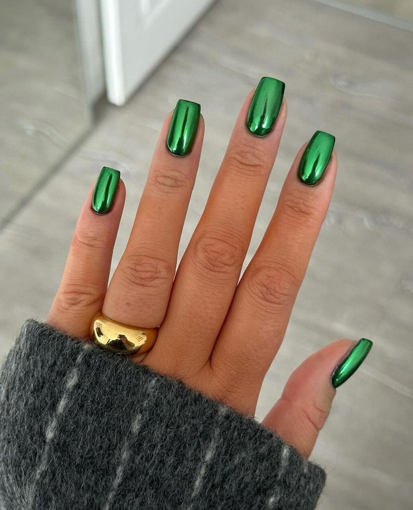 Chromatic emerald green nail polish is on-trend for summer 2024.