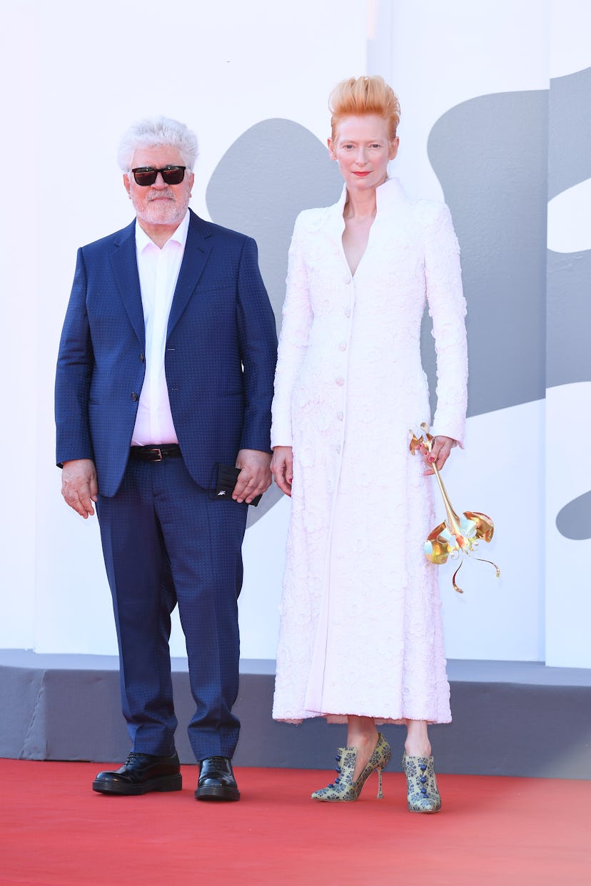VENICE, ITALY - SEPTEMBER 03: Director Pedro Almodóvar and Tilda Swinton walk the red carpet ahead o...
