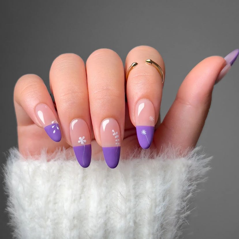 Try purple French nails with flower designs.