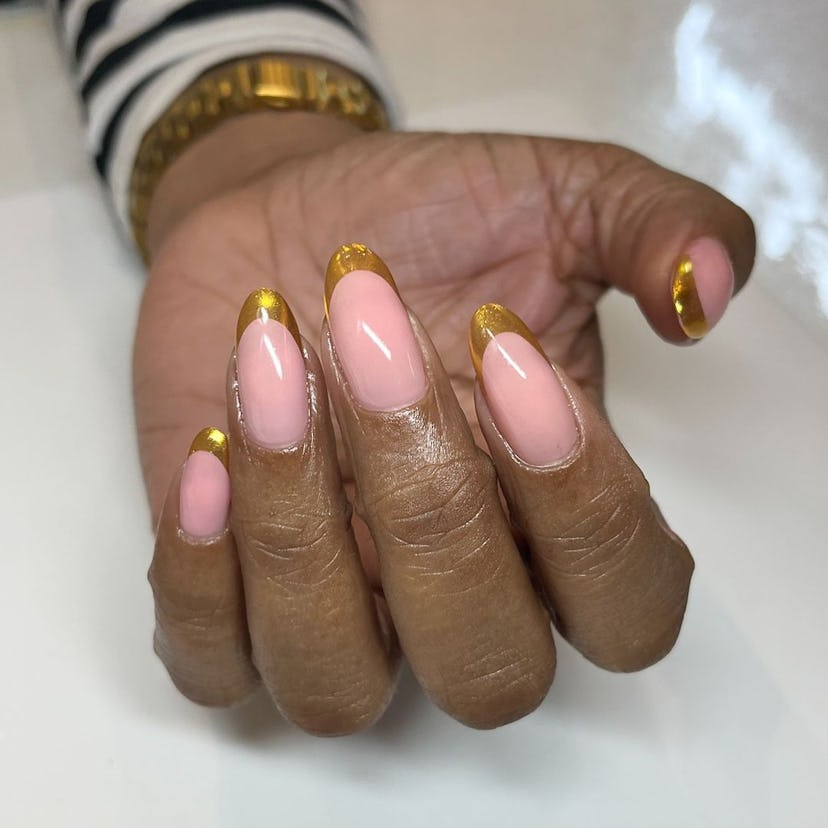 Try gold chrome French nails.