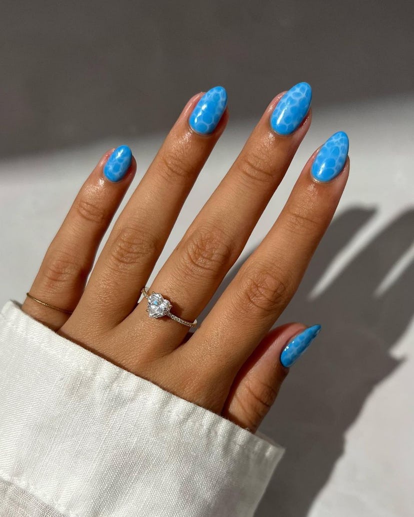 Try pool water-inspired nail designs.