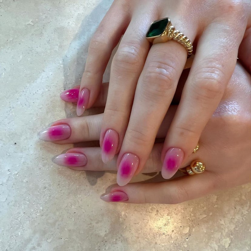 Try hot pink aura nails.