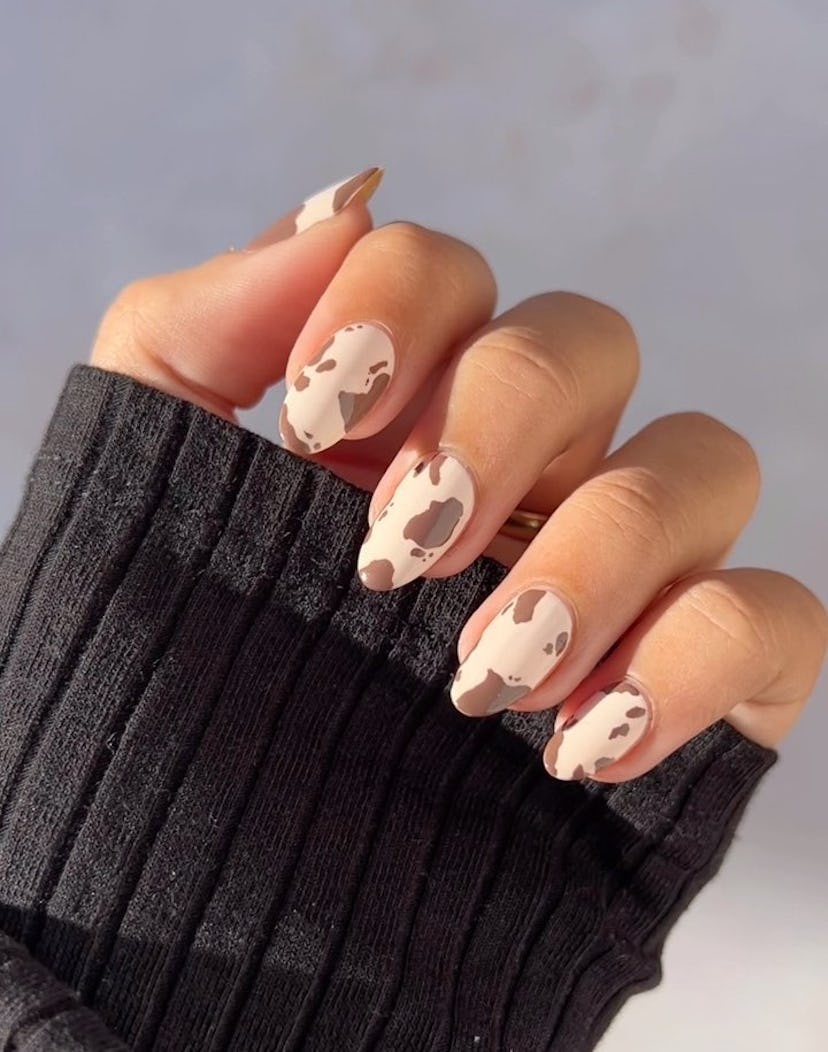 Try brown cow print nails.