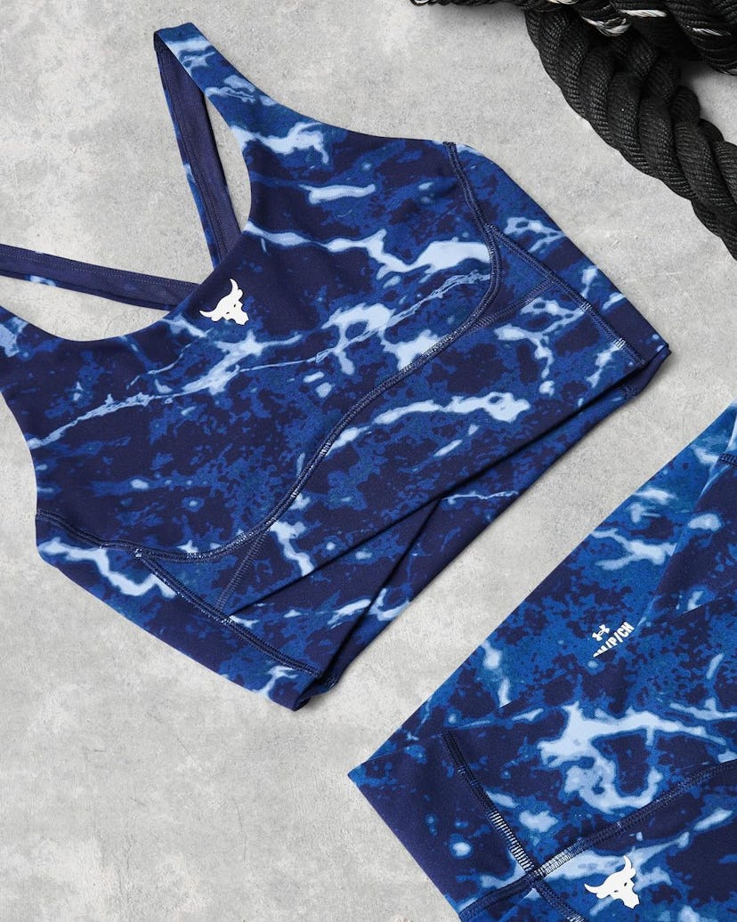 Workout clothes laid on the floor.