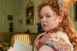 Penelope wearing butterfly earrings in 'Bridgerton.' Photo via Netflix