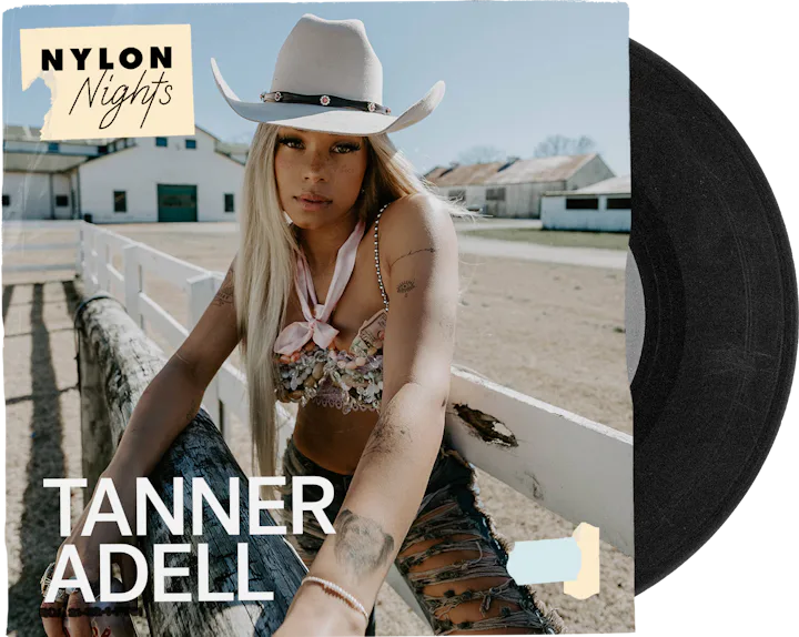Promotional image of Tanner Adell in a cowboy hat, sitting on a fence at a ranch, for Nylon Nights e...