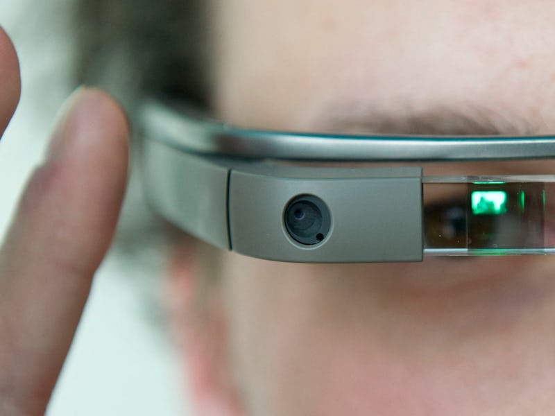 A visitor of the "NEXT Berlin" conference tries out the Google Glass on April 24, 2013 in Berlin. "N...