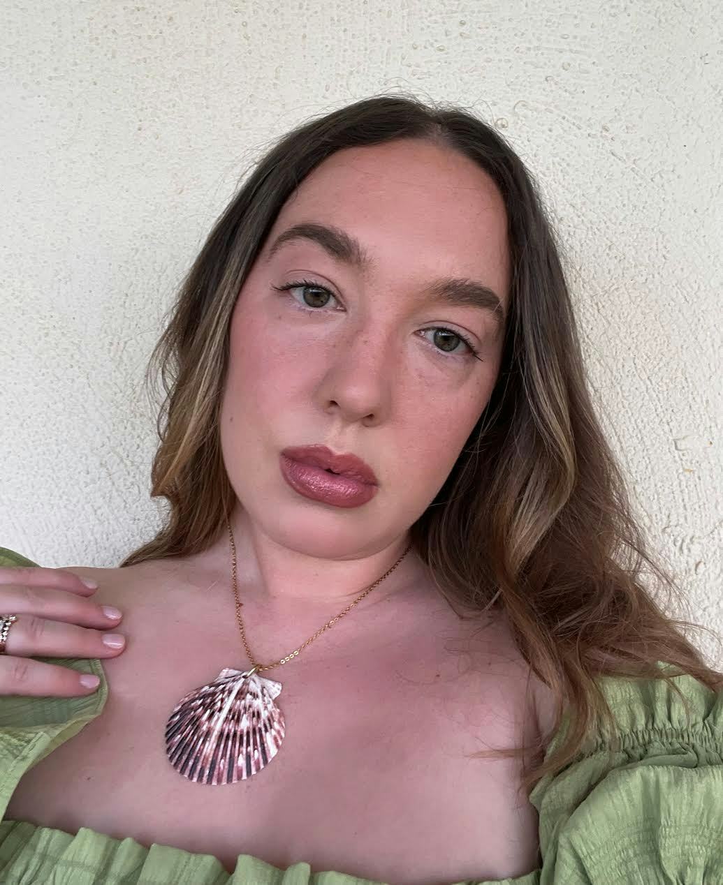 Olivia Rose Rushing wears the Glow Recipe Watermelon Glow Dew Balm.