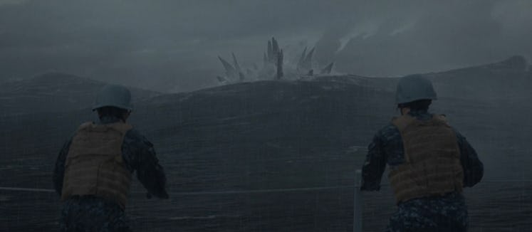 Godzilla swims toward a navy ship in 2014's 'Godzilla'