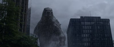 Godzilla stands between two buildings in 2014's 'Godzilla'