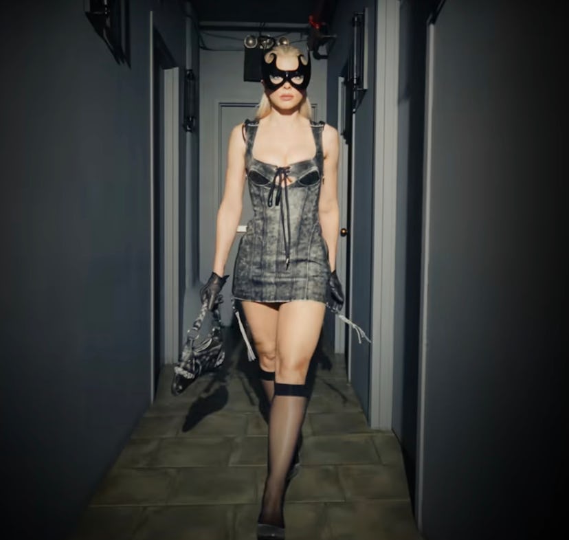 Julia Fox wore a denim mini dress in her new music video