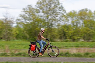 Michael Frank riding Radster trail cargo e-bike that goes 28 mph.