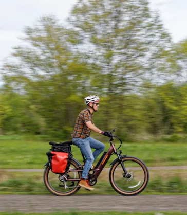 Michael Frank riding Radster trail cargo e-bike that goes 28 mph.