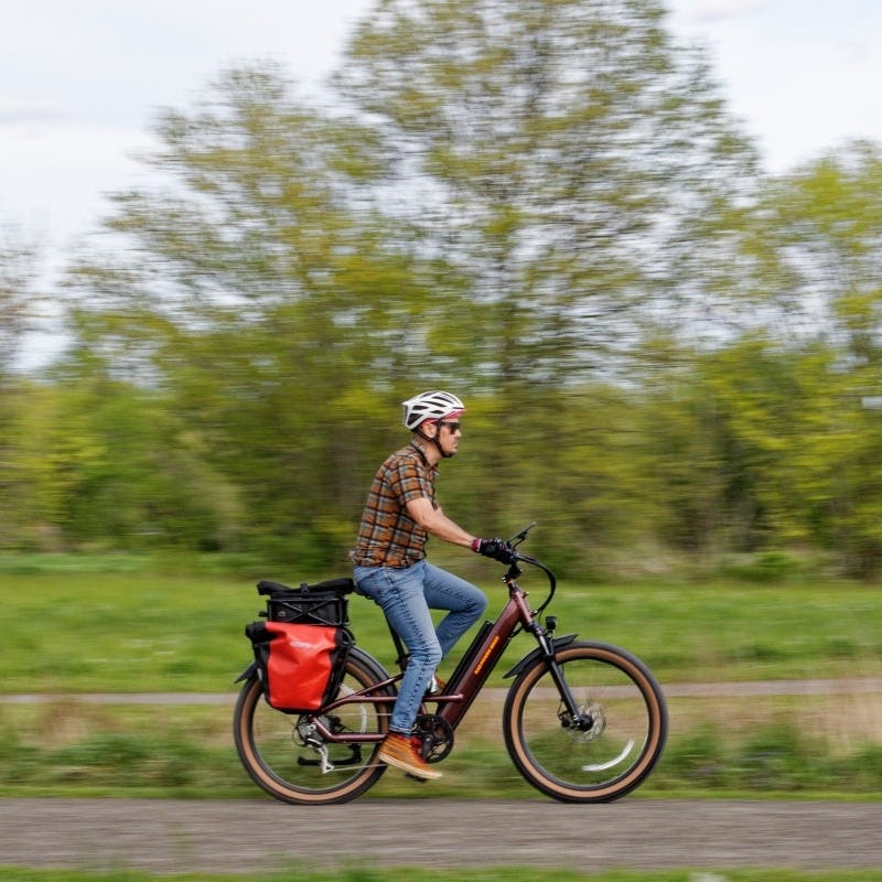 Michael Frank riding Radster trail cargo e-bike that goes 28 mph.
