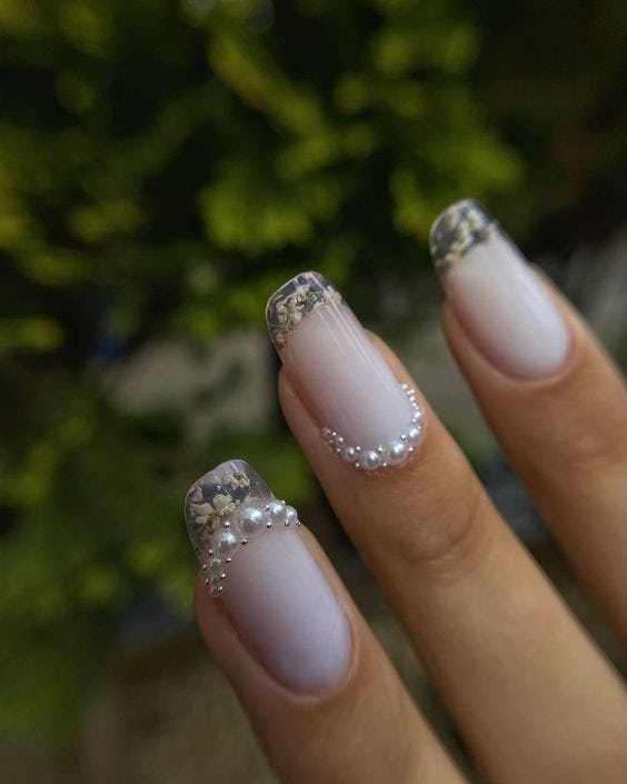 These pearl-lined clear French tip nails are inspired by &lsquo;Bridgerton.'