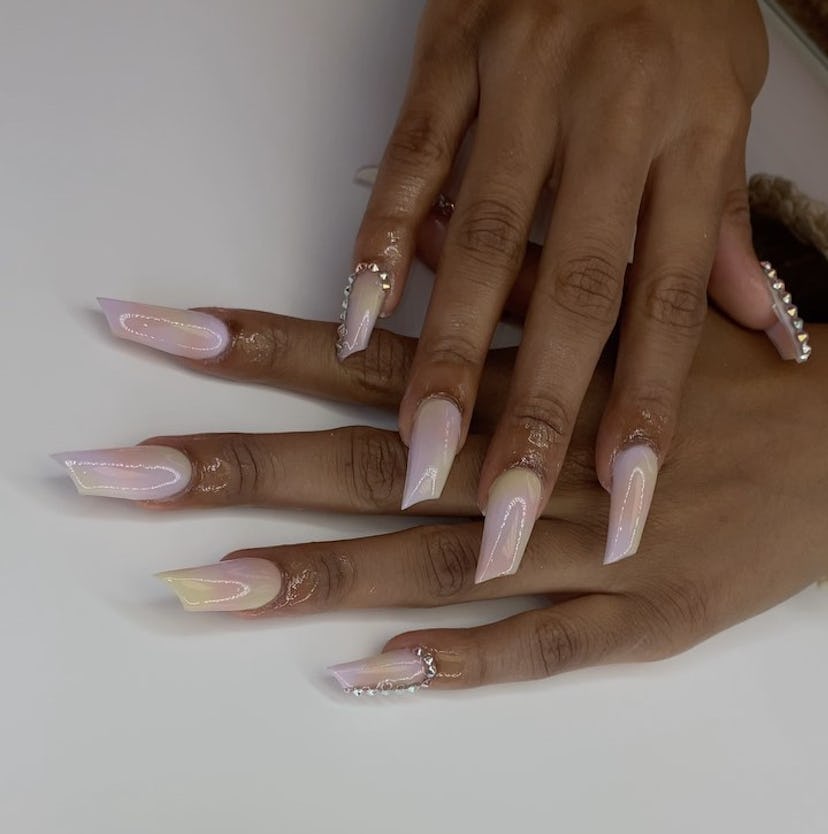 An angled lipstick nail shape is perfect for Leo signs.